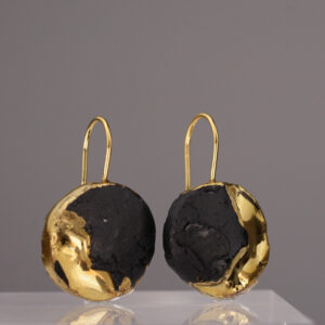 The Black Gold Round No. 64 – a round earring made of deep black porcelain