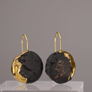 The Black Gold Round No. 66 – a round earring made of deep black porcelain