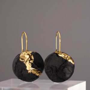 The Black Gold Round No. 67 – a round earring made of deep black porcelain