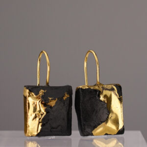 The Black Gold Square No. 69 – a rectangular earring made of black porcelain