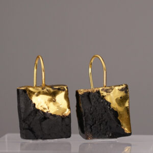 The Black Gold Square No. 71 – a rectangular earring made of black porcelain