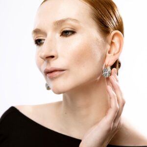 dark whispers porcelain earrings with gold mamutaki handcrafted front view