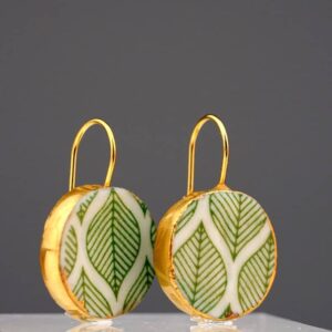 green whispers porcelain earrings with gold mamutaki handcrafted double front view