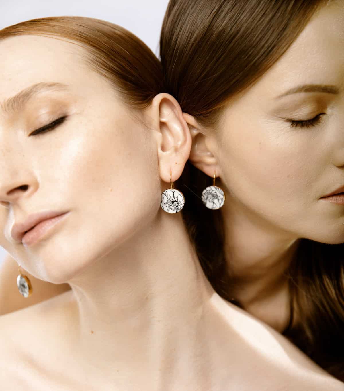 night bird porcelain earrings with gold mamutaki handcrafted front view